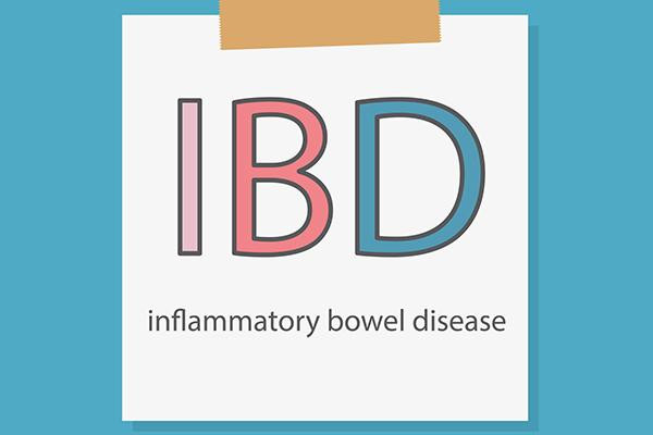 The letters I B D and words inflammatory bowel disease in a white square on a blue background, with a rectangle at the top that resembles a piece of tape.